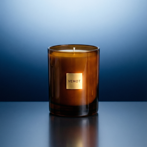 VEMOT scented candle in amber glass jar